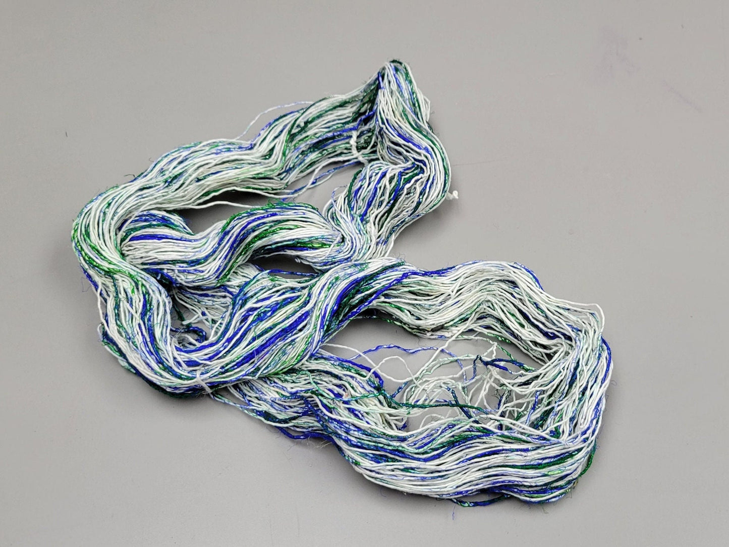 Pasting Yarn - Cotton Yarn Painted Using Silk Saree Waste. 1 Ply. 100 gram. Blue / Green.