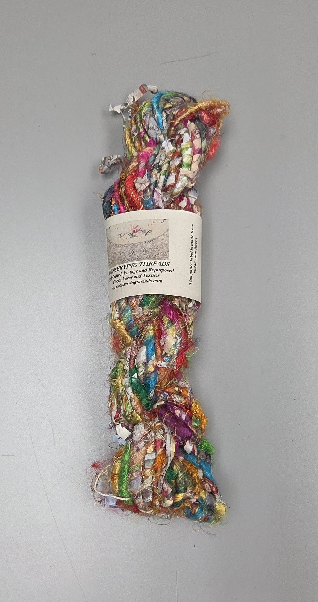 Rainbow Silk and Reclaimed Paper Yarn Skein. Approx. 15 Yards , Newspaper