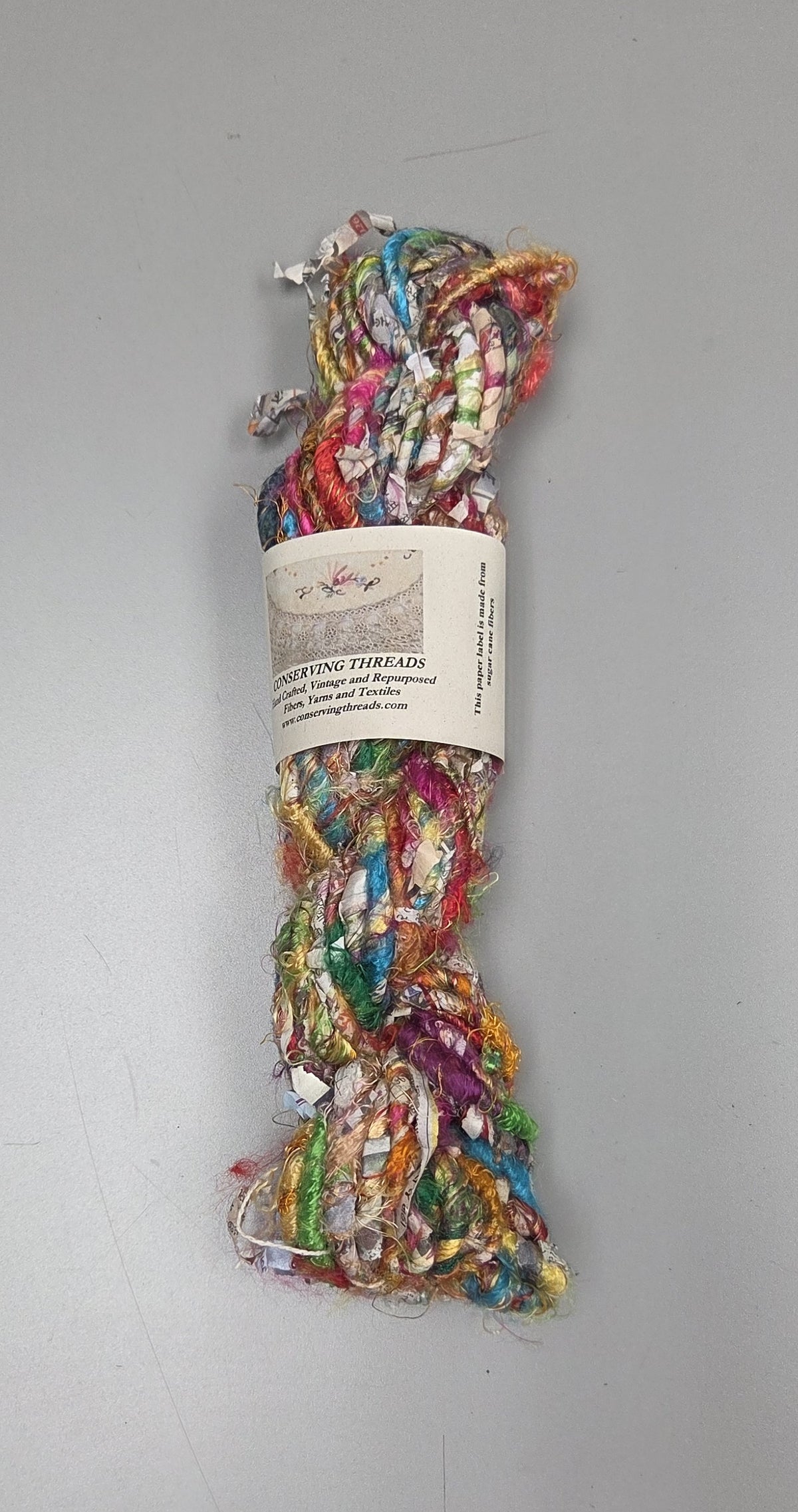 Rainbow Silk and Reclaimed Paper Yarn Skein. Approx. 15 Yards , Newspaper
