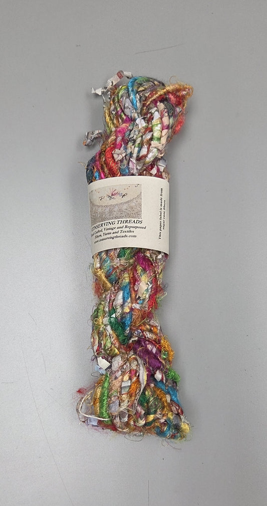 Rainbow Silk and Reclaimed Paper Yarn Skein. Approx. 15 Yards , Newspaper