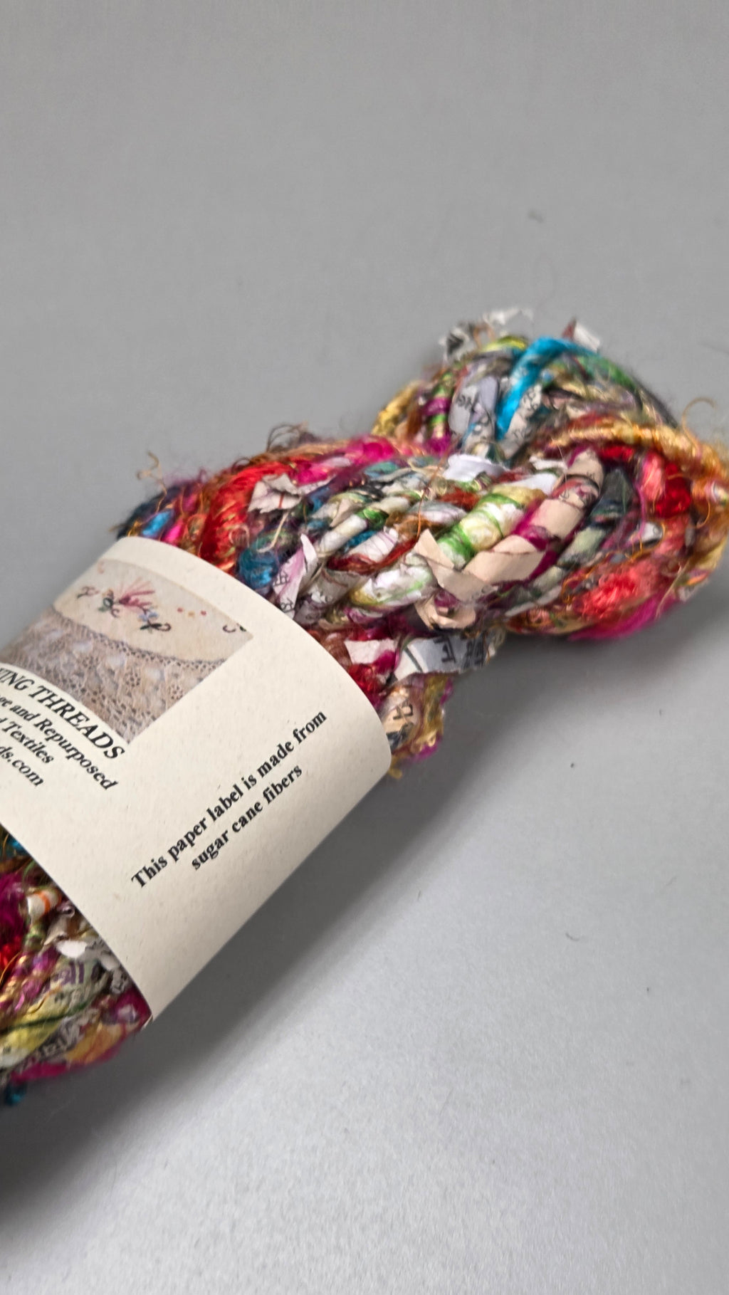 Rainbow Silk and Reclaimed Paper Yarn Skein. Approx. 15 Yards , Newspaper