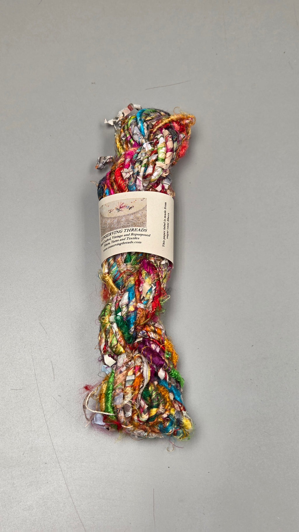 Rainbow Silk and Reclaimed Paper Yarn Skein. Approx. 15 Yards , Newspaper