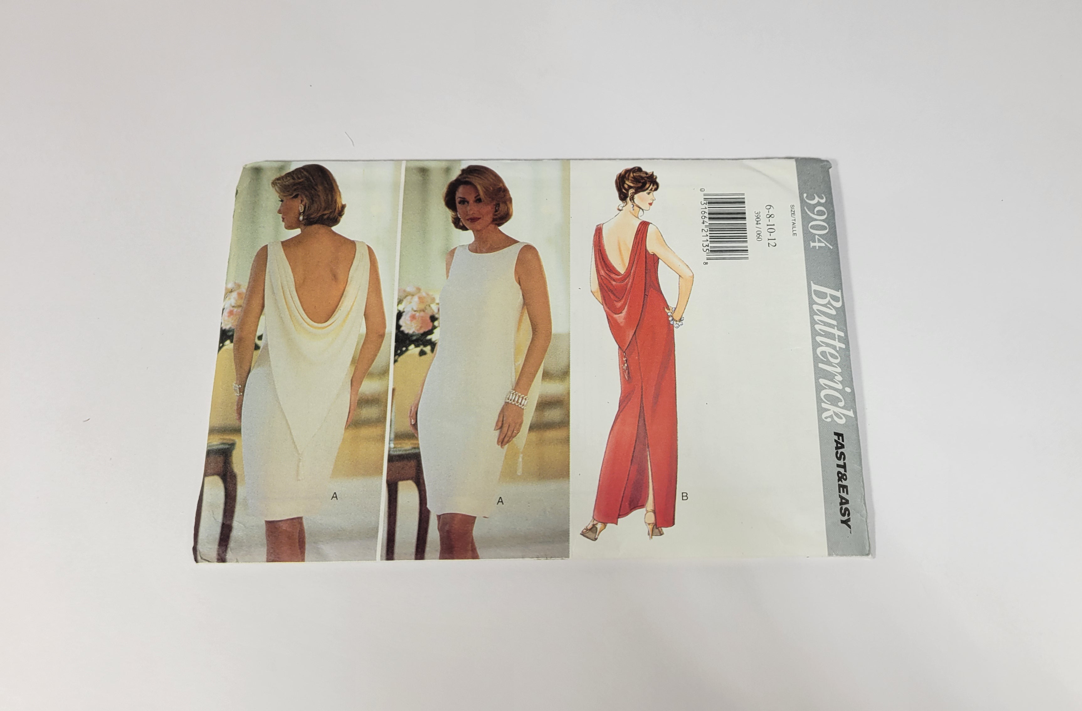 Butterick Pattern 3904, ca 1995. Size 6-8-10-12. Misses' Close-fitting, lined, straight, sleeve - bias, self-lined drape and back zipper.