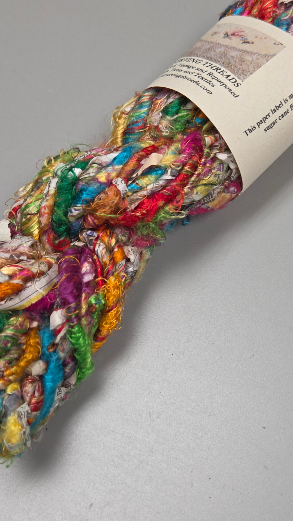 Rainbow Silk and Reclaimed Paper Yarn Skein. Approx. 15 Yards , Newspaper