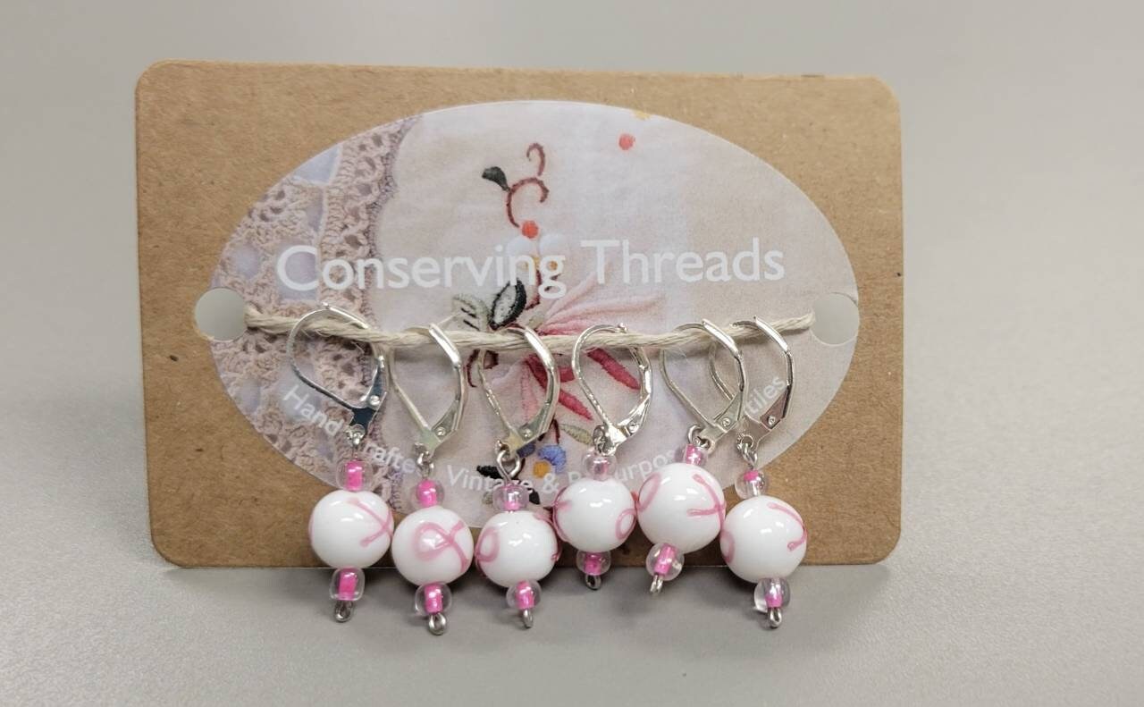 Stitch Markers. Set of 6. White and Pink Glass Beads Cancer Awareness Ribbon Metal Clasp.
