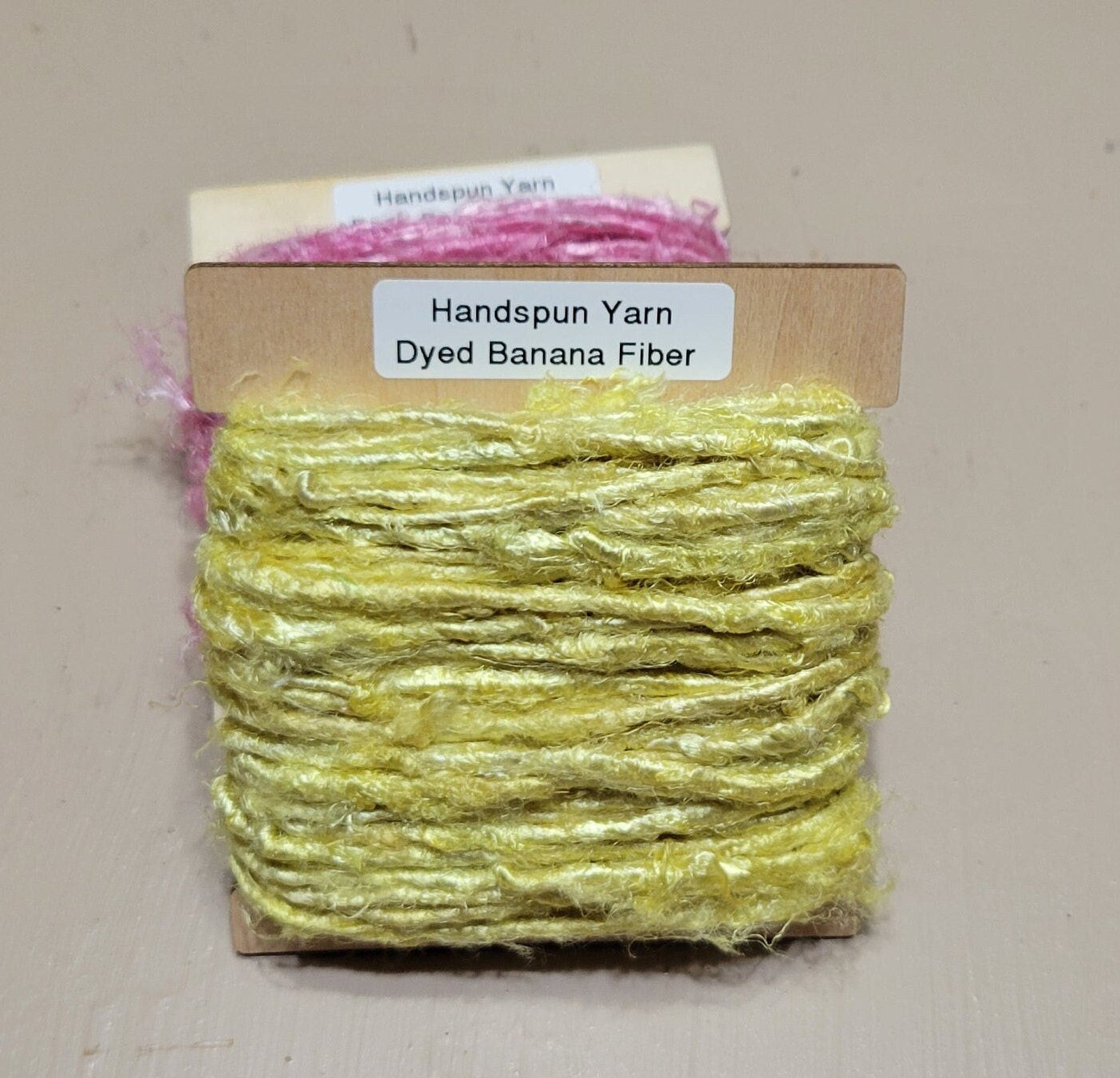 Banana. Reclaimed Yarn. Hand-Spun Fibers Upcycled. Yellow, Gold, Orange, Pink and Red